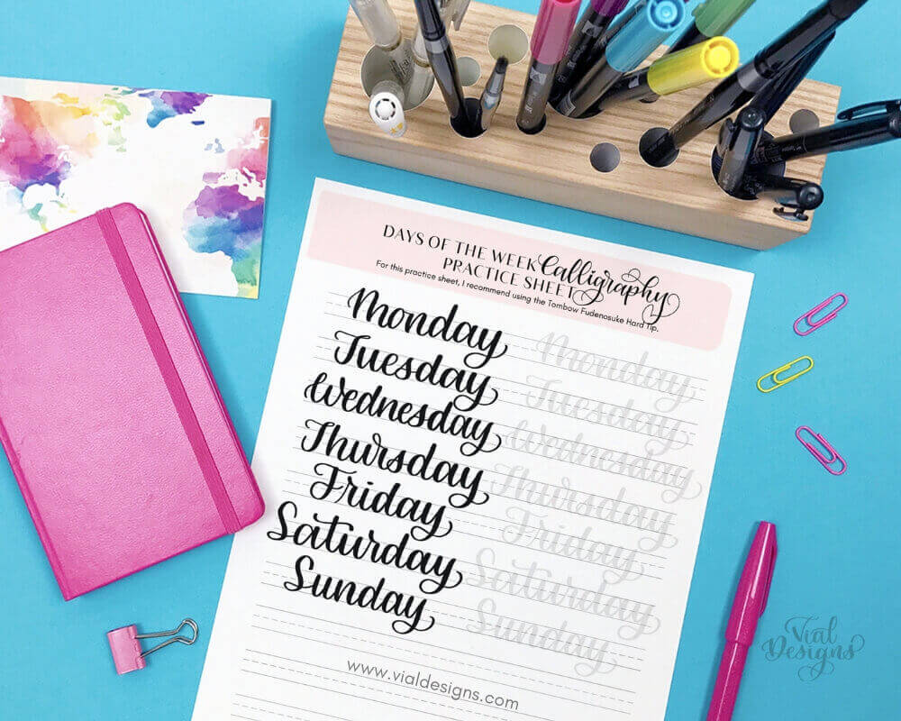 Days of the Week Calligraphy Tutorial by Vial Designs_Brush Pens and Blue background