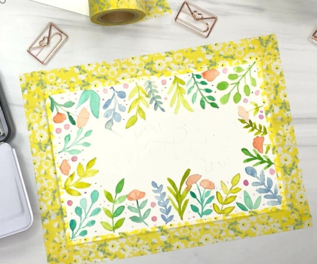 floral doodles with watercolors around the Mother's Day DIY card's border
