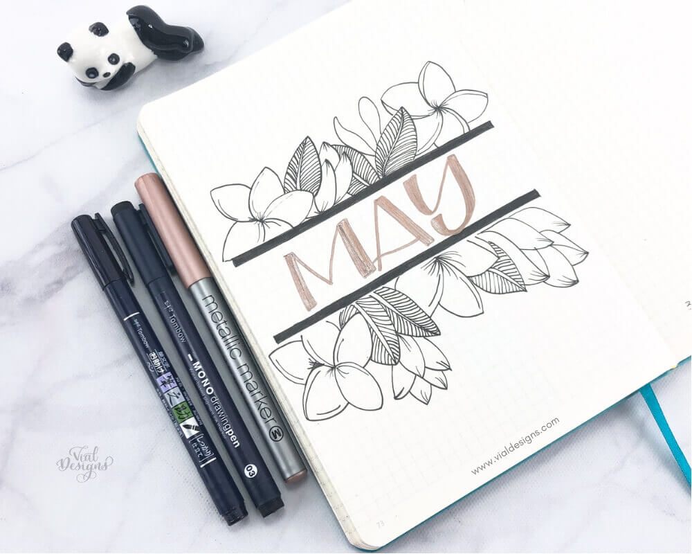 May cover page of my bullet journal set up with floral line drawings
