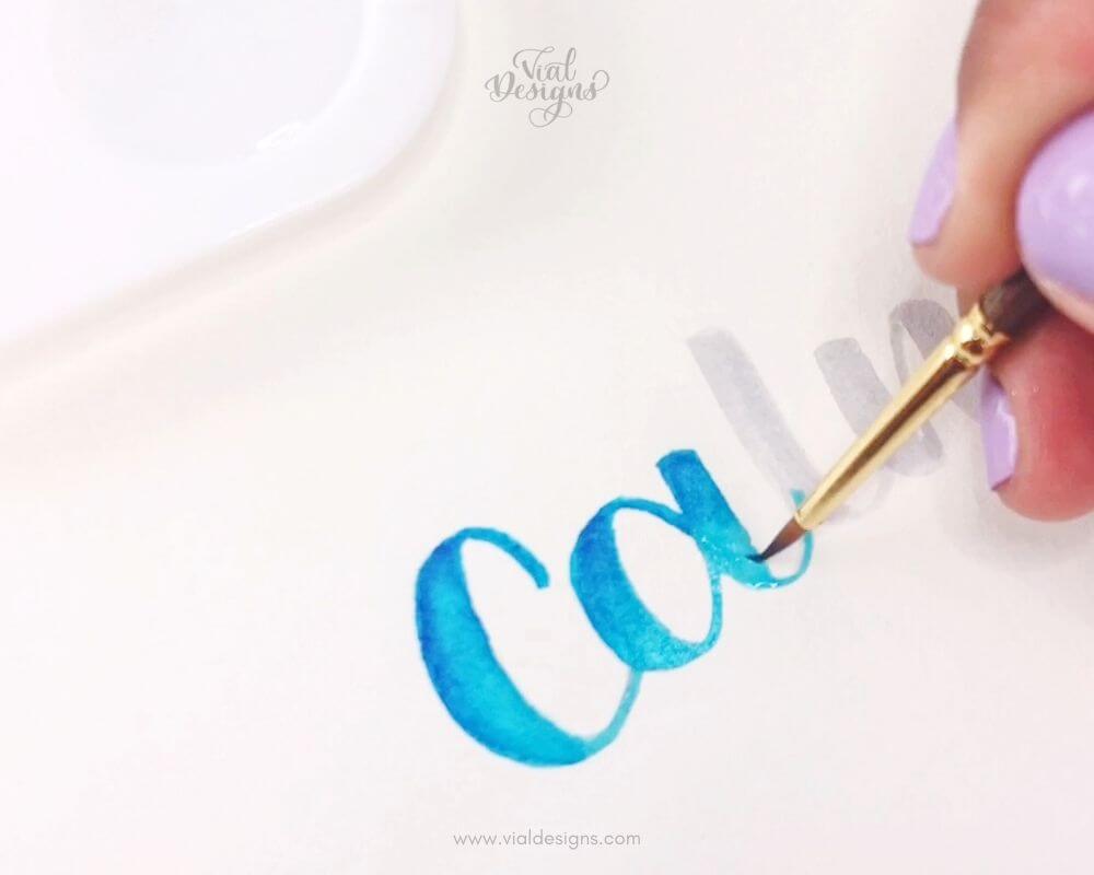 Step 3 adding water to blend color _Watercolor Blending Lettering Tutorial by Vial Designs