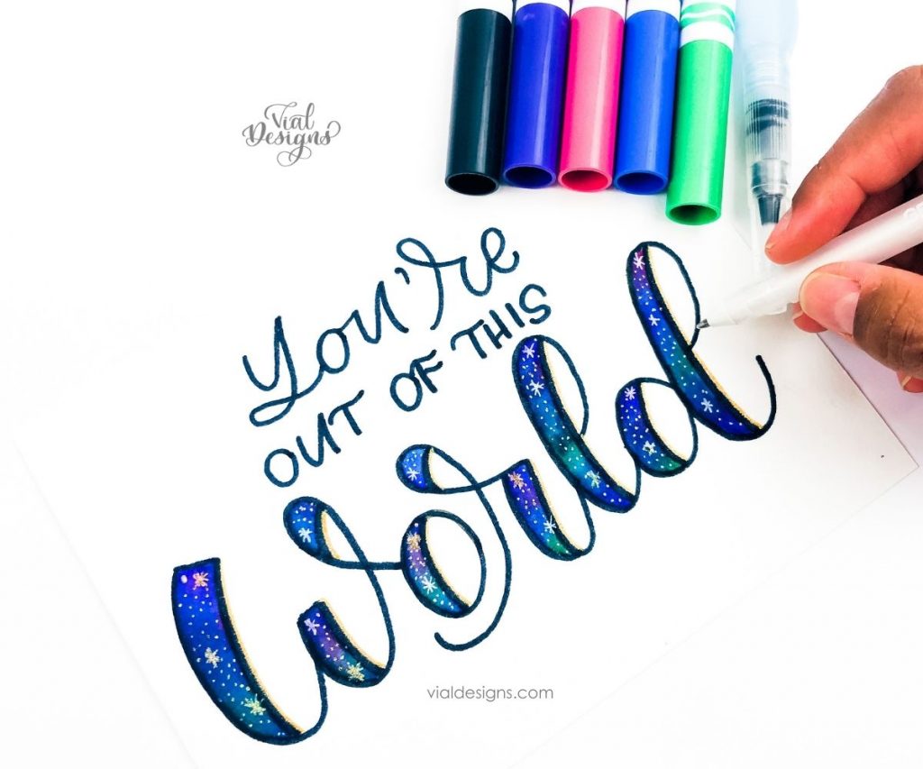 You're out of this world galaxy lettering with crayola markers