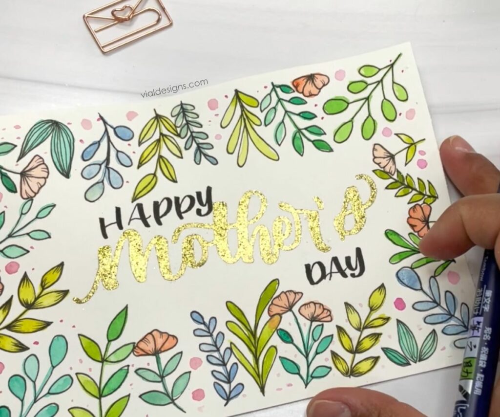embossed lettering with flower doodles