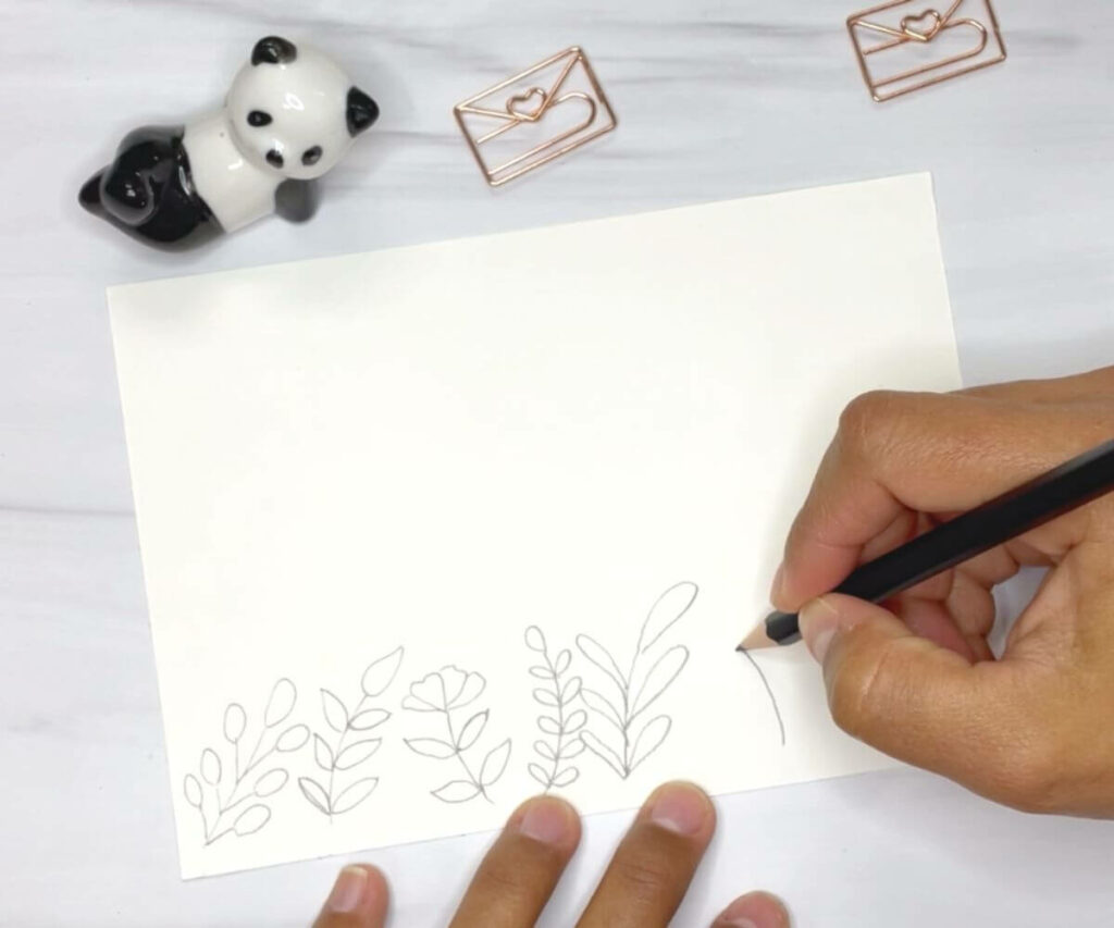 easy to draw floral doodles around the card's border